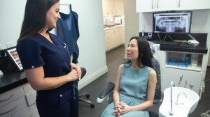 Patient being provided with detailed background and details regarding her dental treatment